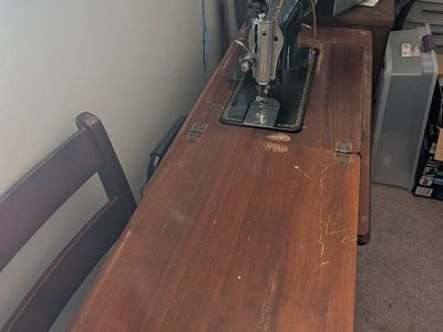 Vintage Singer Treadle Sewing Machine with Wooden Cabinet and Accessories