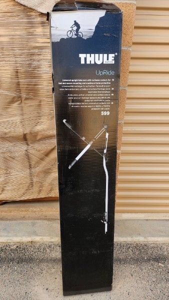 2 THULE UpRide roof-top bike racks
