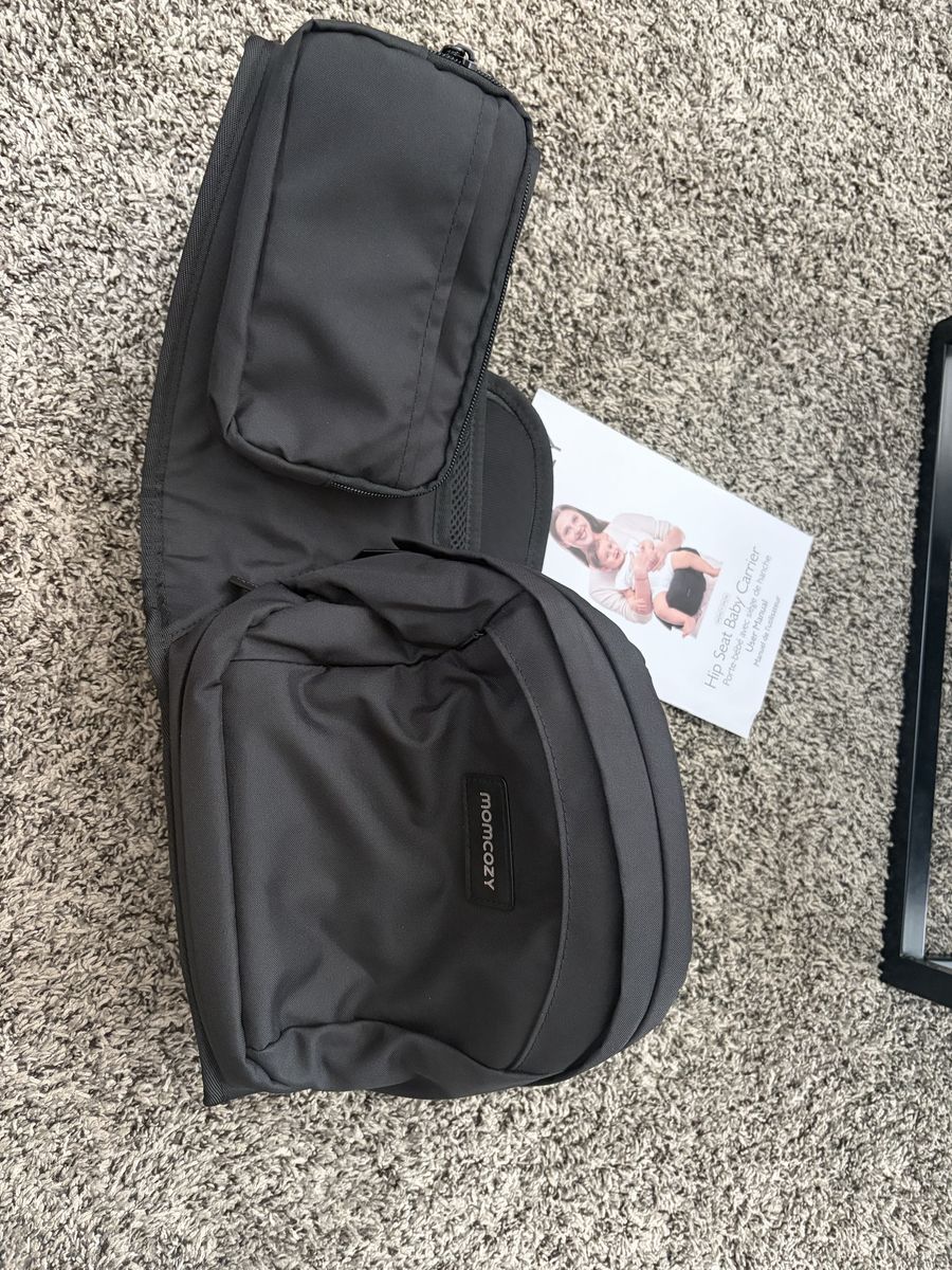 Momcozy Hip Seat Baby Carrier in Black with Storage Pockets