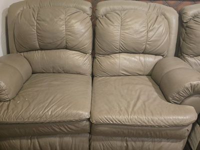 Recliner leather couch and chair.