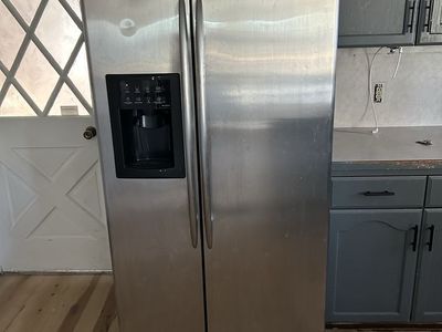 GE Profile Stainless Steel Side-by-Side Refrigerator with Ice & Water Dispenser