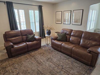 Leather power sofa and loveseat- flexsteel