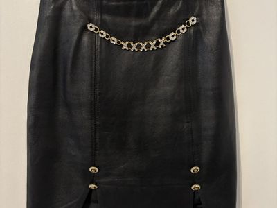 Chic Black Leather Skirt with Gold Accent Hardware & Slits – 26" Waist