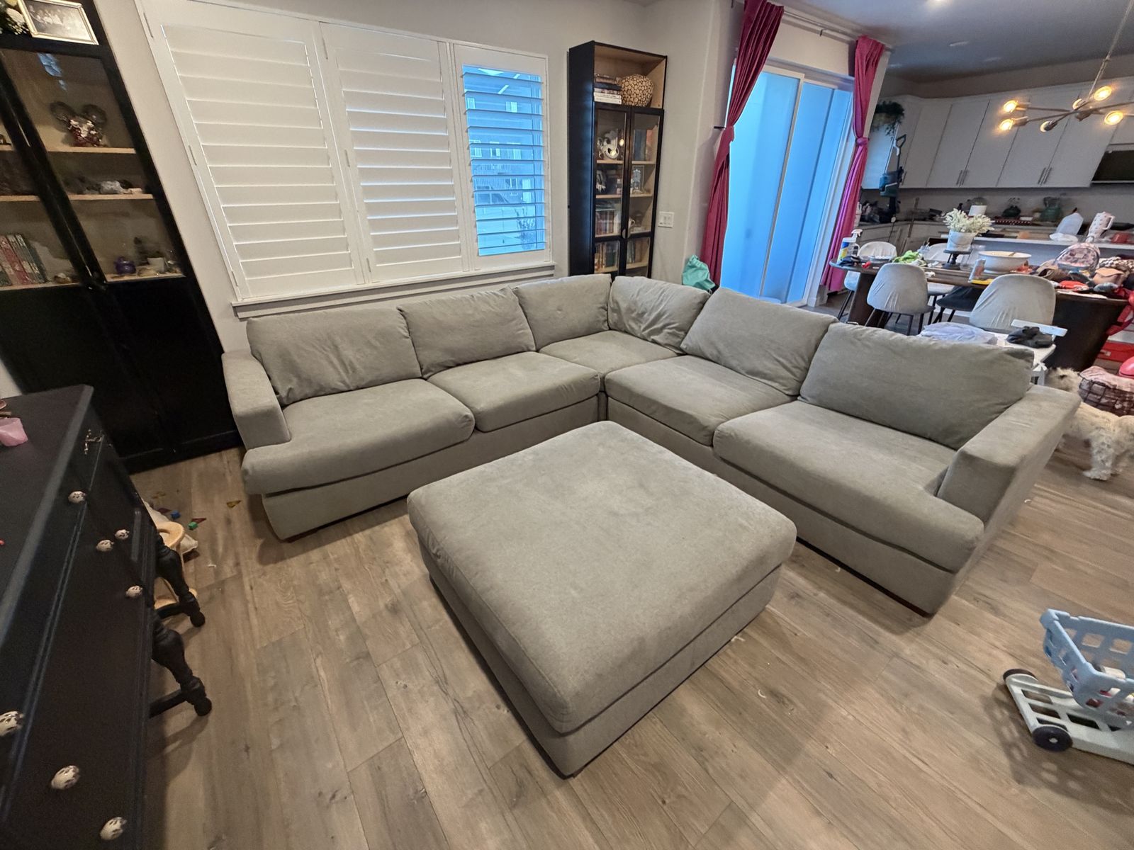 Grey sectional sofa with ottoman 