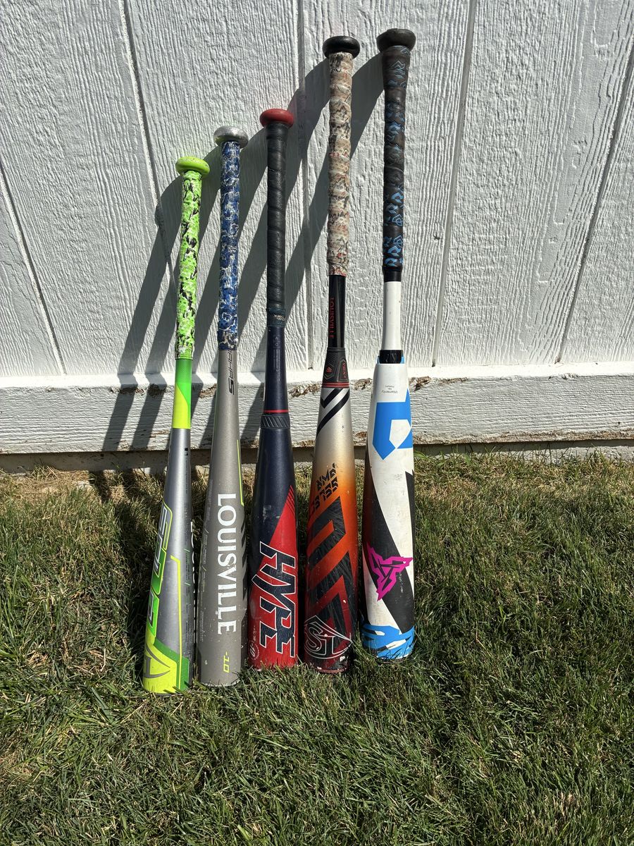 5 baseball bats good condition
