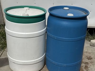 55 gallon water barrels (6 of them)- $10 each