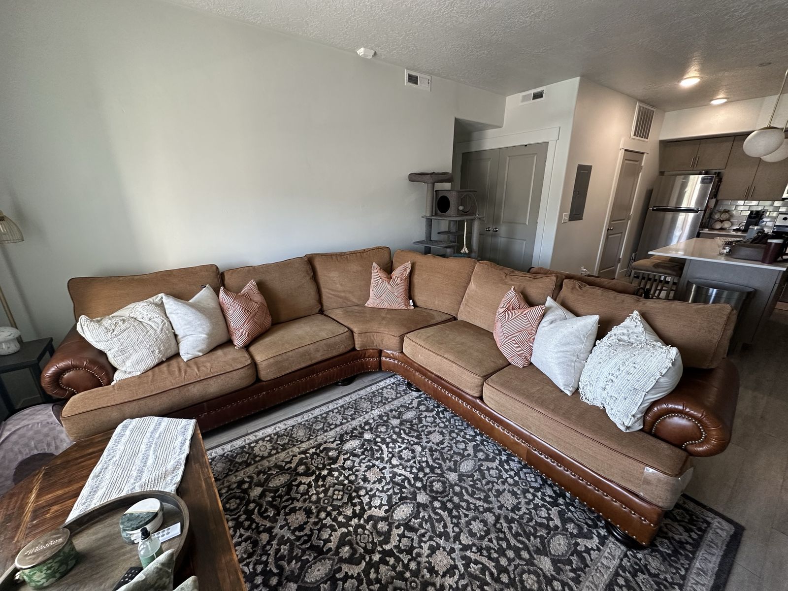 Large Brown Sectional Sofa with Fabric and Leather Trim