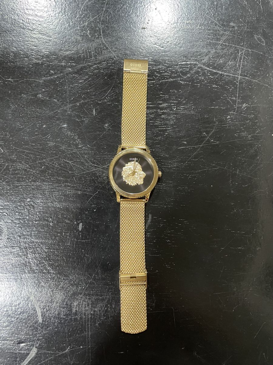Gold plated guess watch
