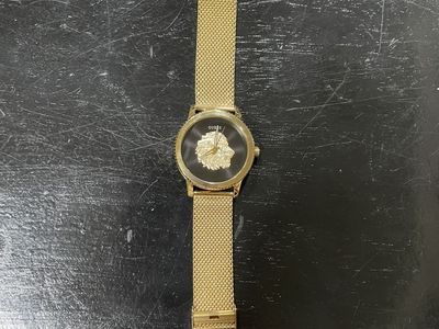 Gold plated guess watch