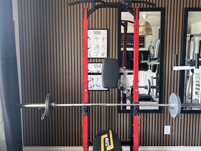 Unbranded Red & Black Weight Bench with Barbell and Plates