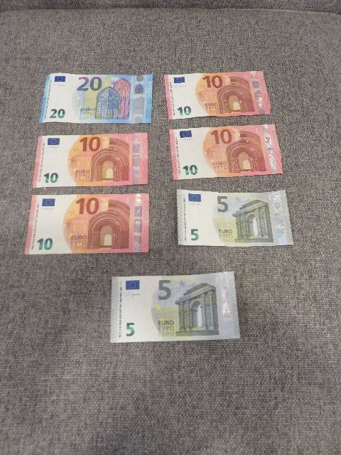 TOTAL OF 70 EUROS - VARIOUS BILL DENOMINATIONS - HEADING TO EUROPE?