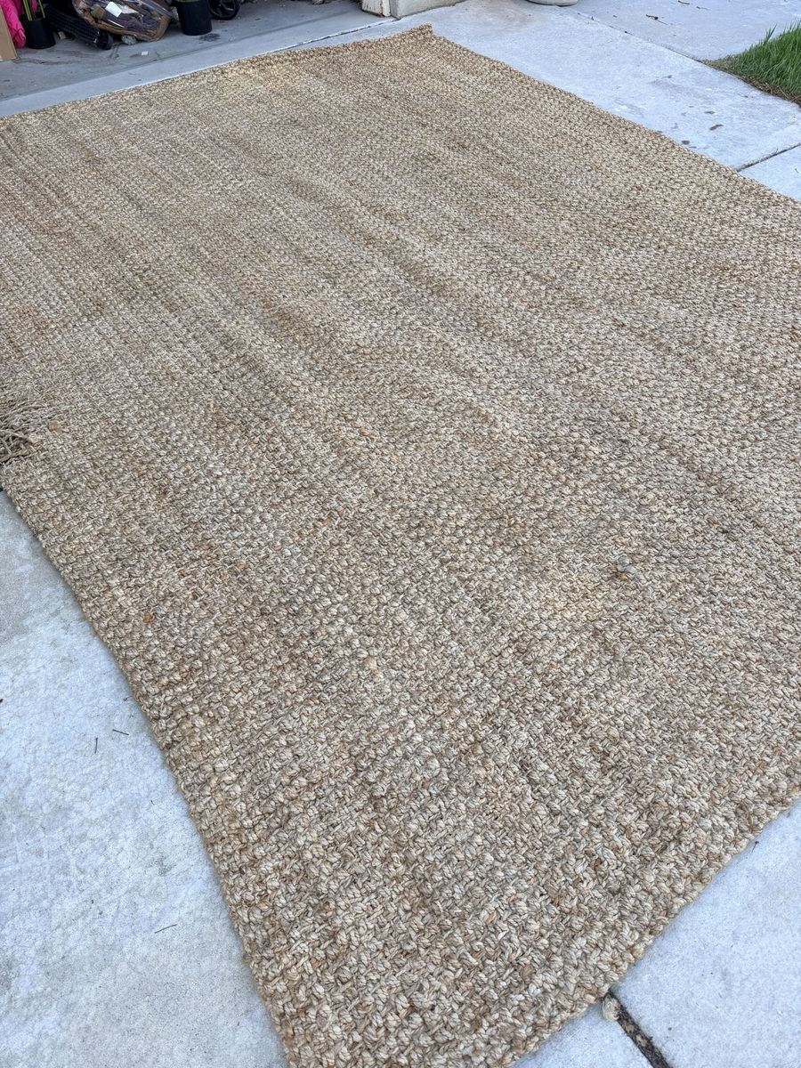 New. Jute 9x12 Damage On 1 Edge. Couch Will Cover!