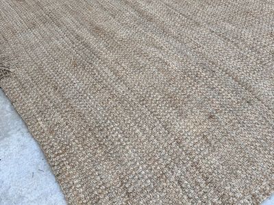 New. Jute 9x12 Damage On 1 Edge. Couch Will Cover!