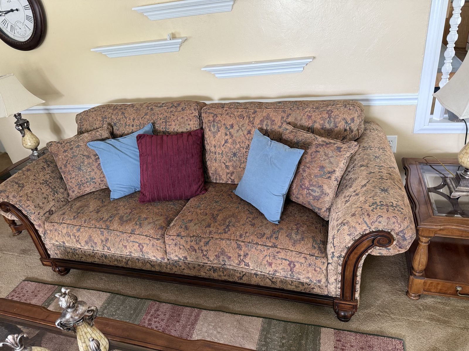 Sofa, coffee and end tables and decor.