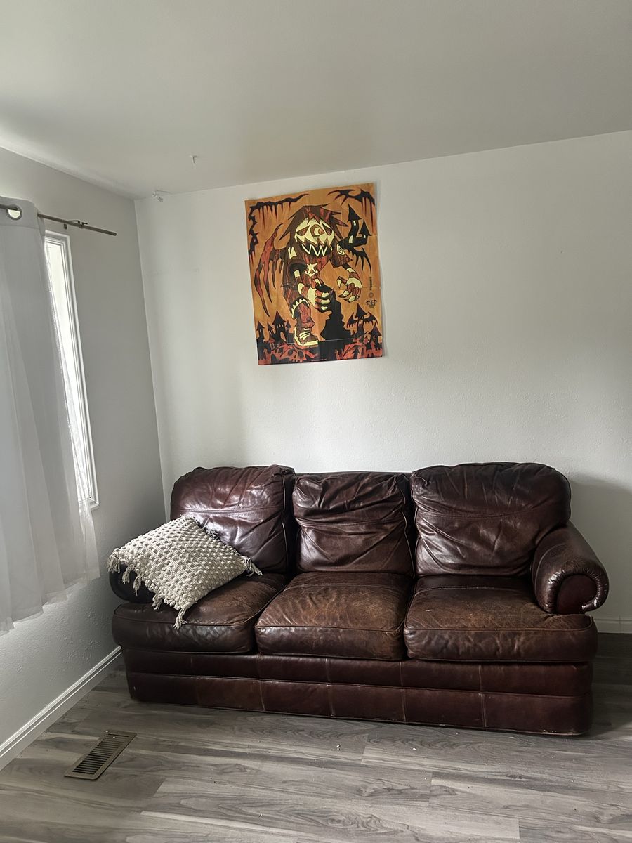 Distressed Brown Leather Couch