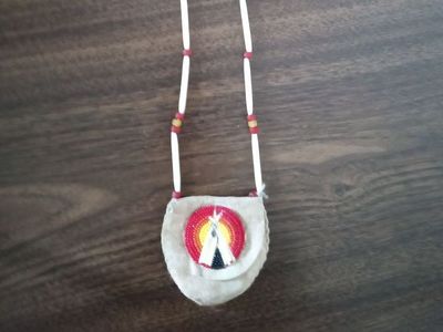 Native American medicine bag necklace with teepee medallion