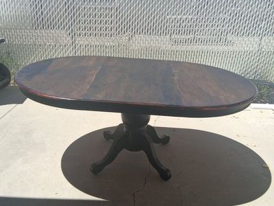 Round to Oval Dark Wood Dining Table with Pedestal Base - Extendable