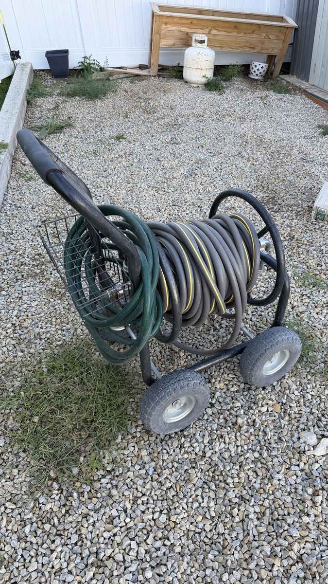 Hose reel on wheels with hose