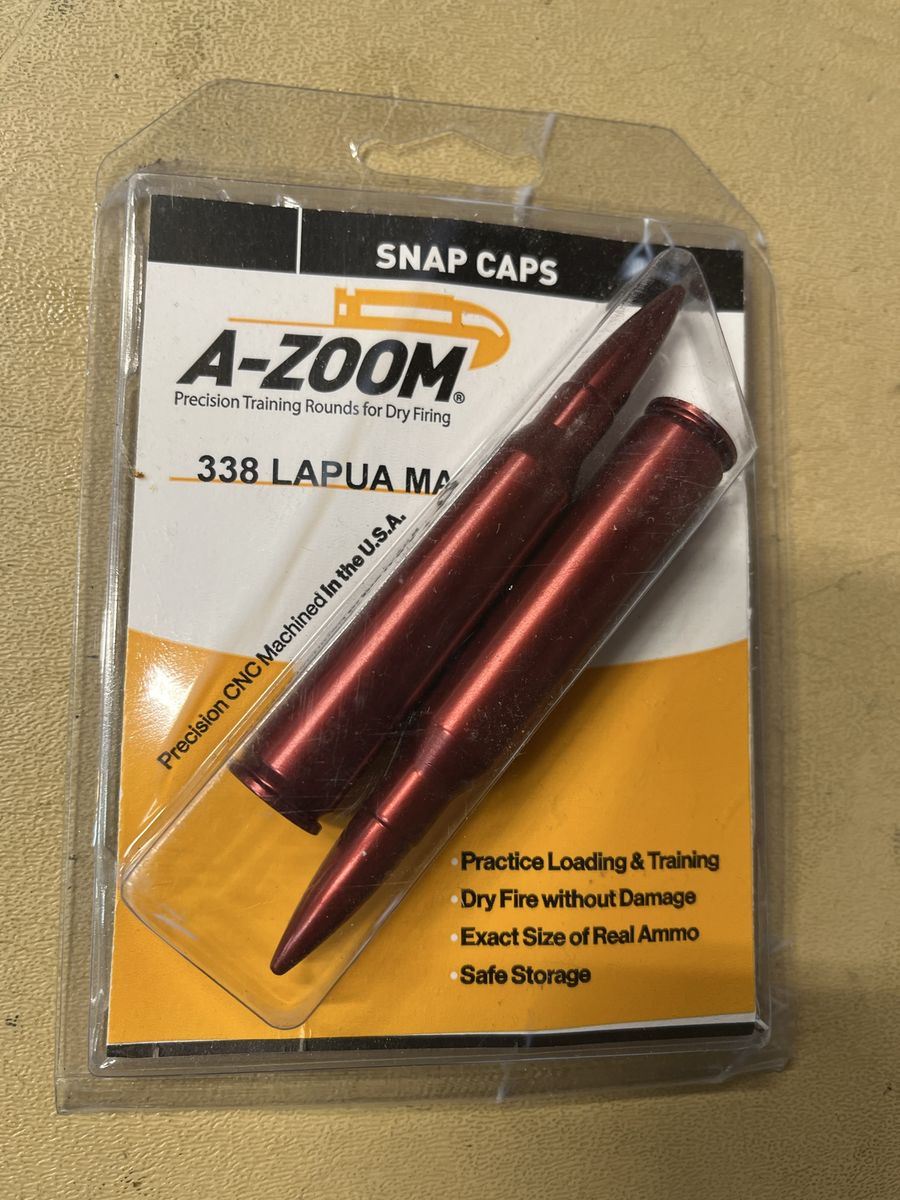 338 Lapua Mag snap caps. 
