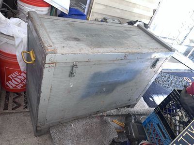 vintage industrial US Army military riveted wooden footlocker or steamer trunk