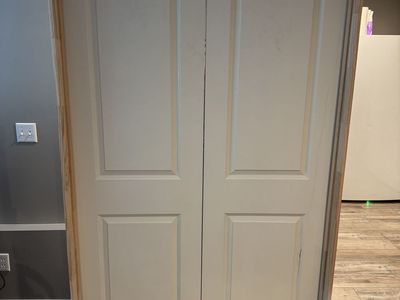 Pre-hung Bifold French Door, White, 48”X80” Excellent Condition
