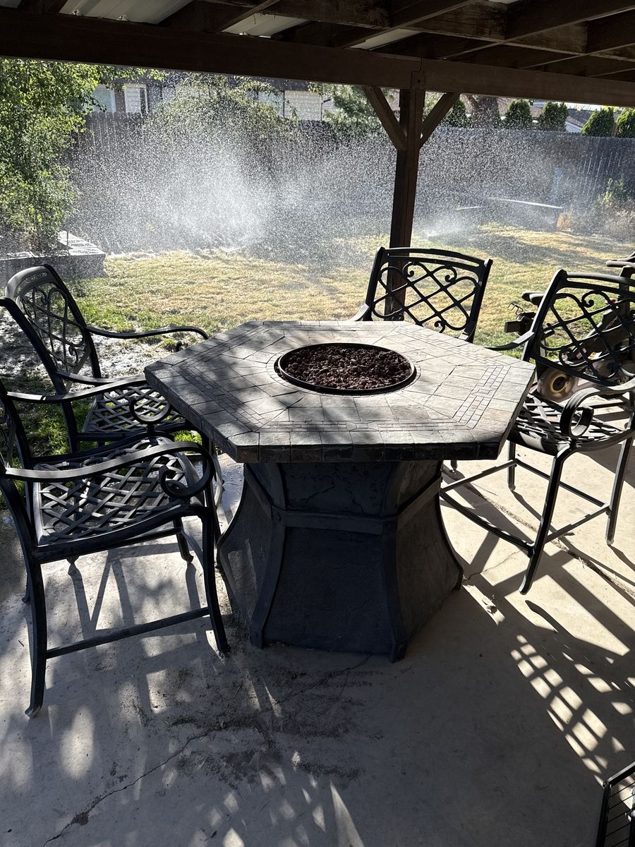 Outdoor table fire place w/chairs