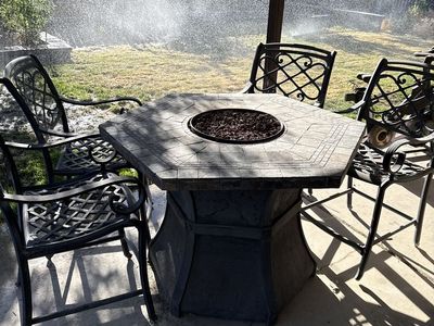 Outdoor table fire place w/chairs