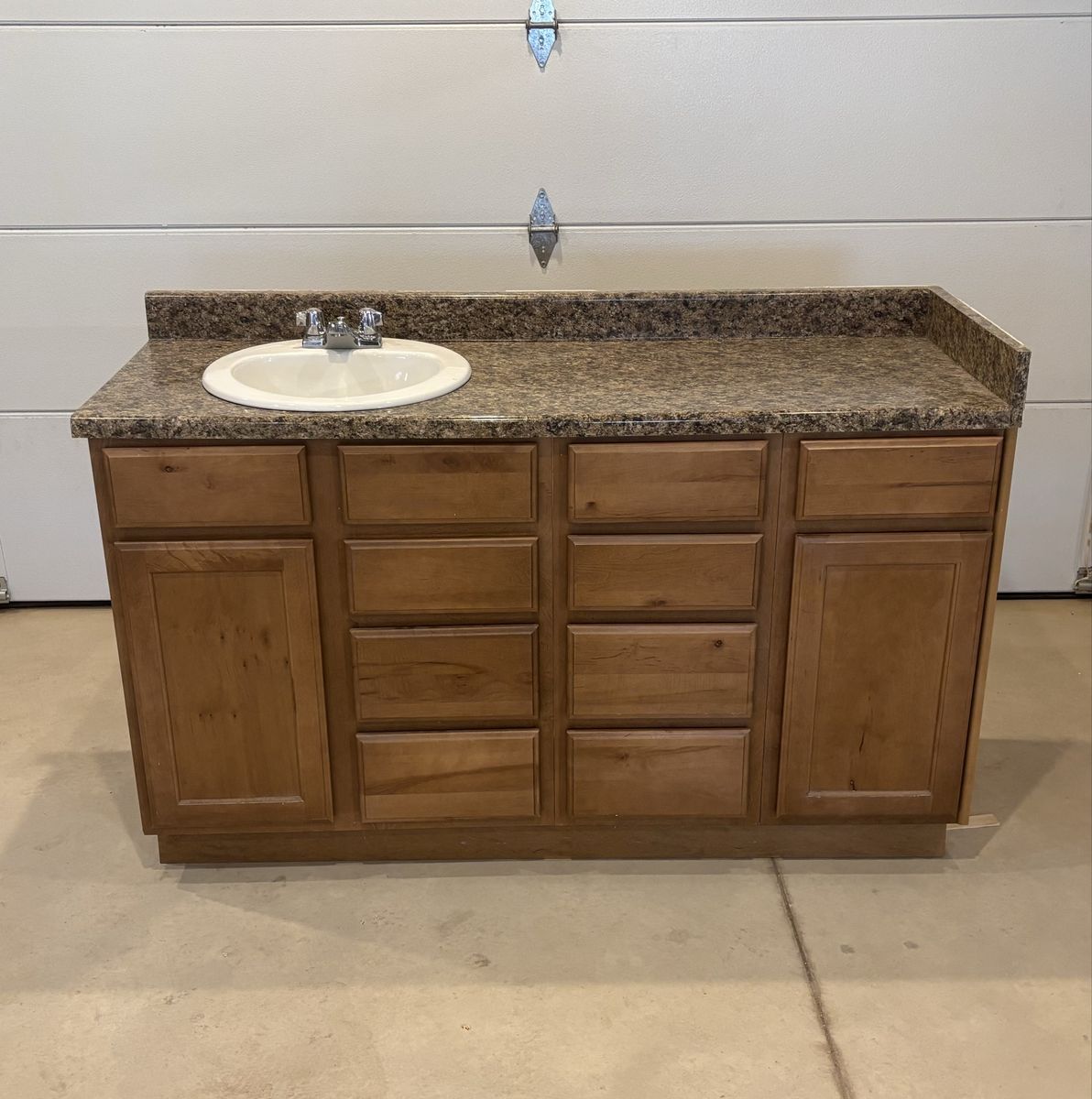 5’ wide bathroom vanity with countertop sink and faucet