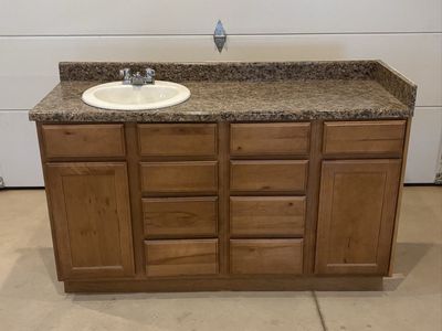 5’ wide bathroom vanity with countertop sink and faucet