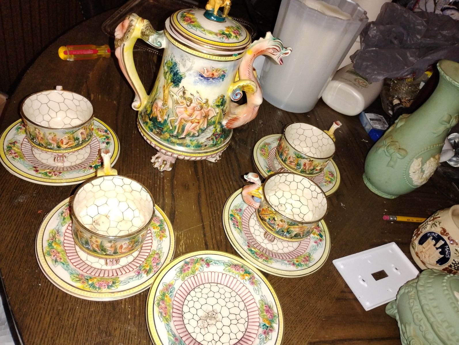 Capodimonte dragon handle and sene of lover tea set