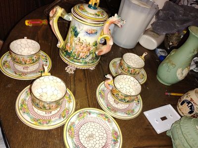 Capodimonte dragon handle and sene of lover tea set