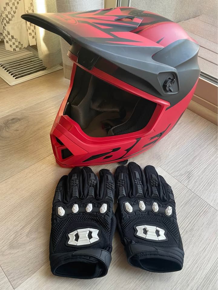 Dirt bike helmet with gloves