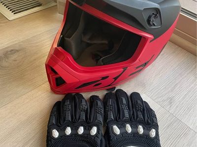 Dirt bike helmet with gloves