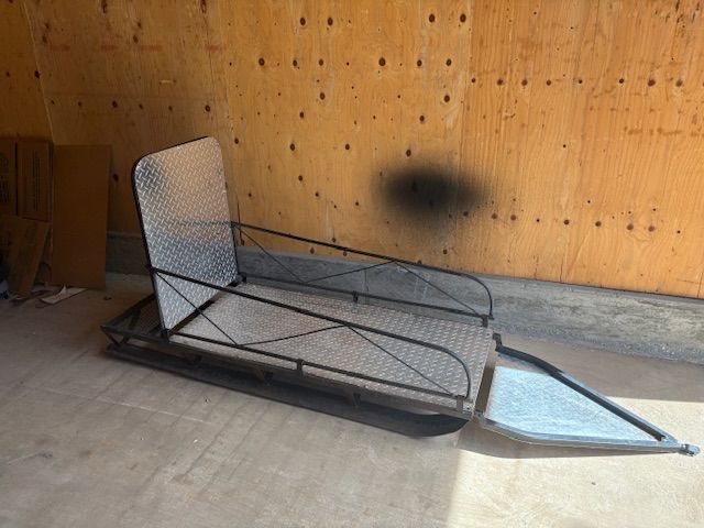 Snowmobile Towing Snow Sled.