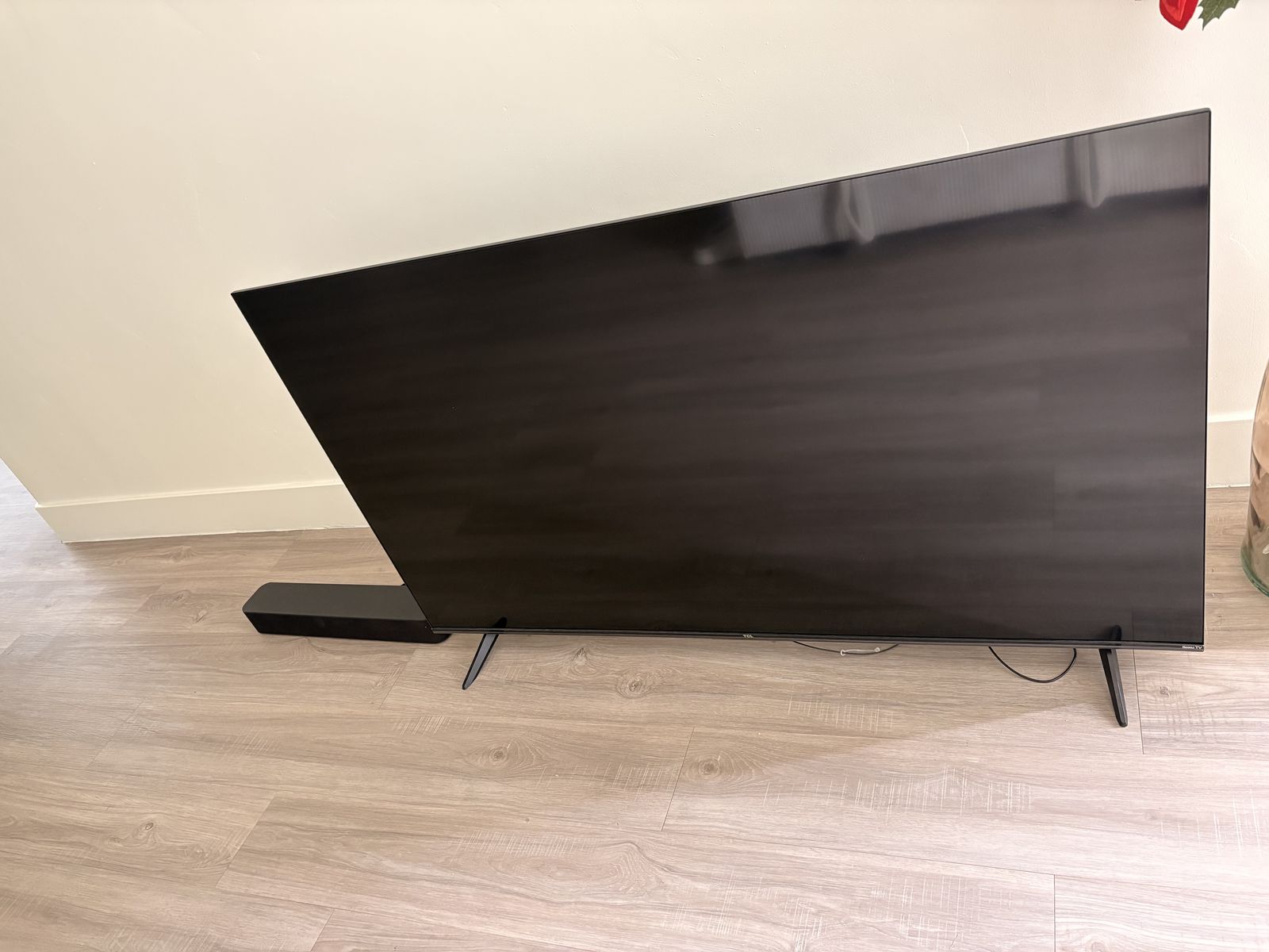 Televisor con barra de sonido