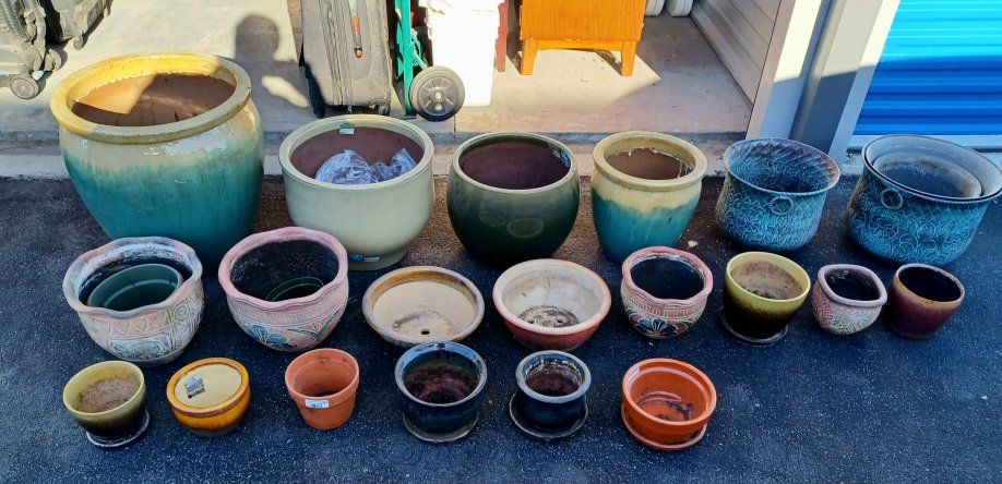 Assorted Ceramic, Metal, and Terracotta Plant Pots. 2 Metal Stands.oboe. Largest is 19" x 19". $499 obo.