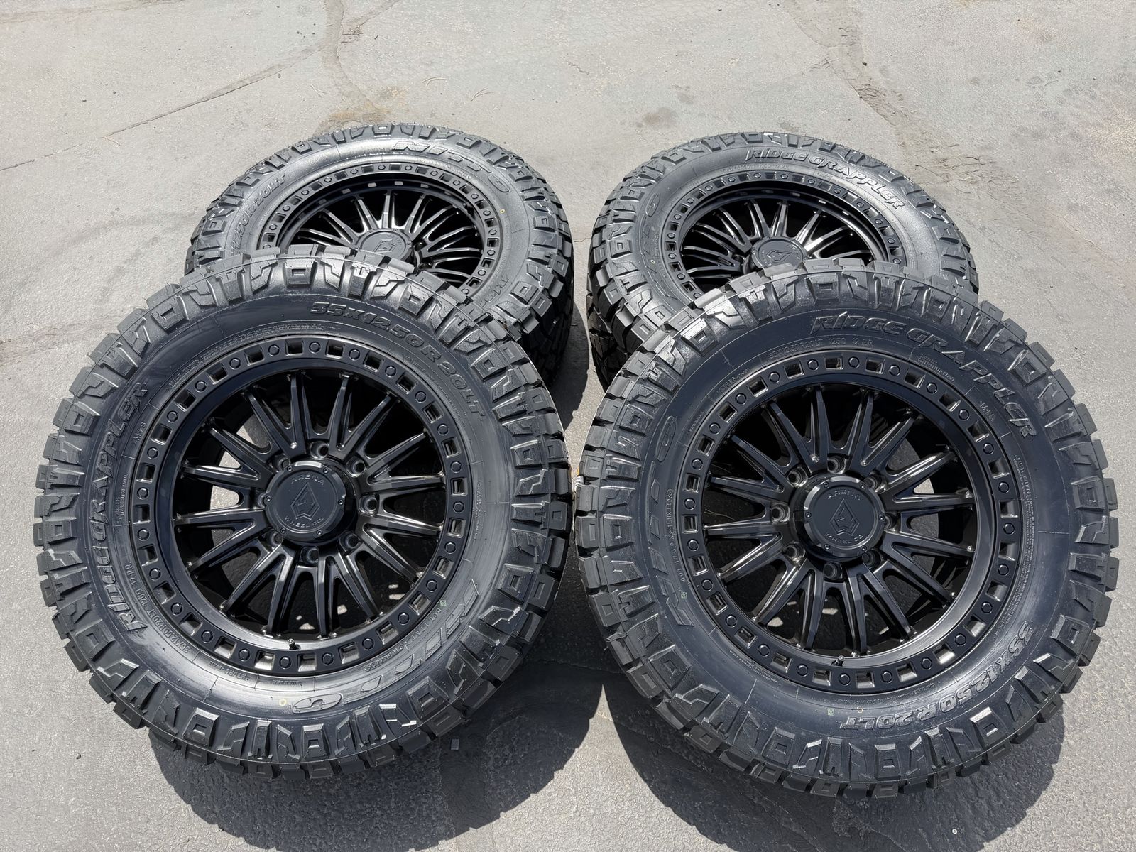 New 35x12.50r20 Nitto Ridge Grappler Black Arena Mission 8x180 Chevy Silverado GMC 2500 3500 8 lug Duramax wheels and tires
