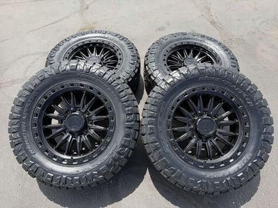 New 35x12.50r20 Nitto Ridge Grappler Black Arena Mission 8x180 Chevy Silverado GMC 2500 3500 8 lug Duramax wheels and tires