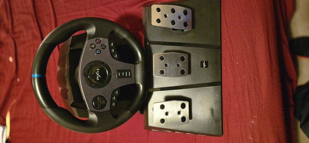 steering wheel with pedals and shifter knob