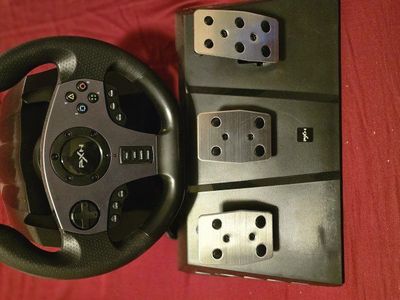 steering wheel with pedals and shifter knob