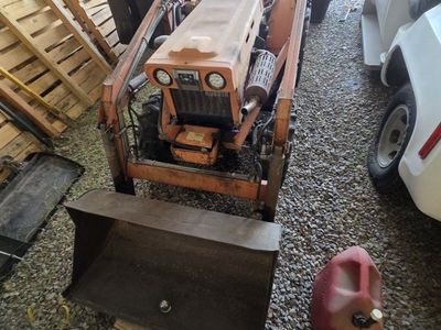 Kubota Compact Utility Tractor with Front Loader Attachment