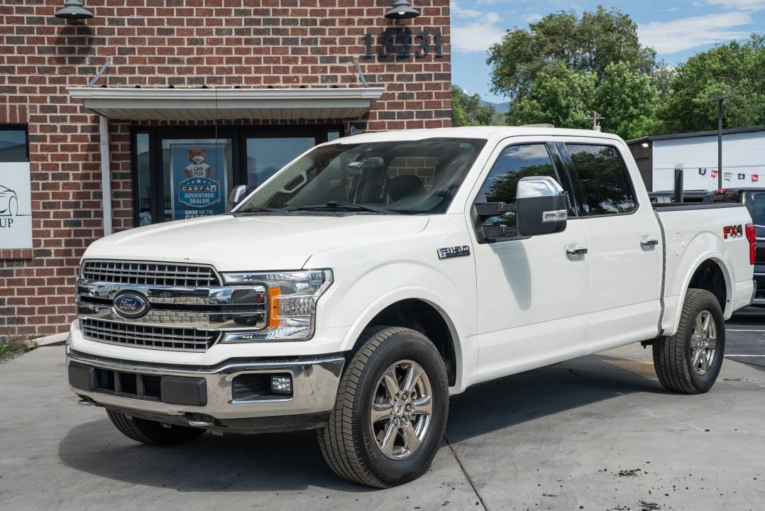 2020 Ford F-150 Lariat — rebuilt & branded title, 5% below market