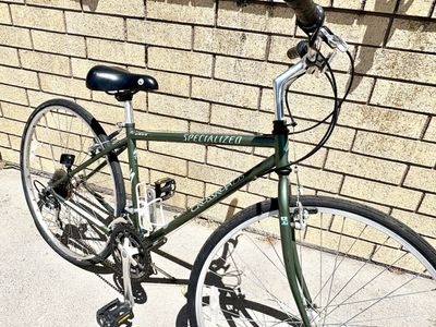 Specialized Crossroads commuting town bike. Size 16.”5 frame. Sweet green color. Times shifts/brakes/rides great