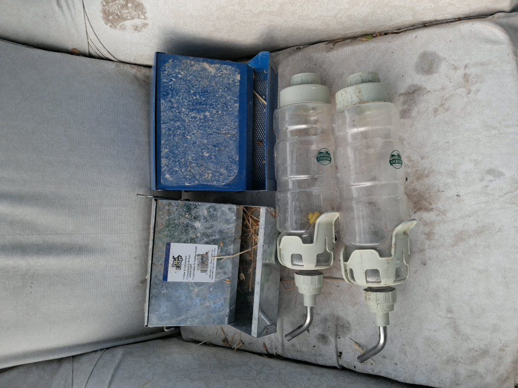 bunny feeders and water bottles