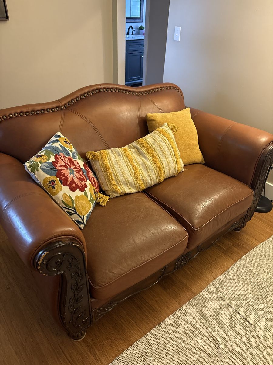 Leather couch & loveseat w/wood accents