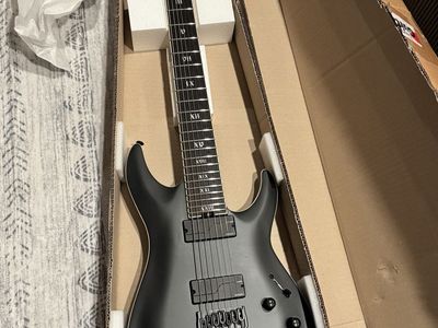 SCHECTER Dimond series C-7 sls elite "evil twin" guitar