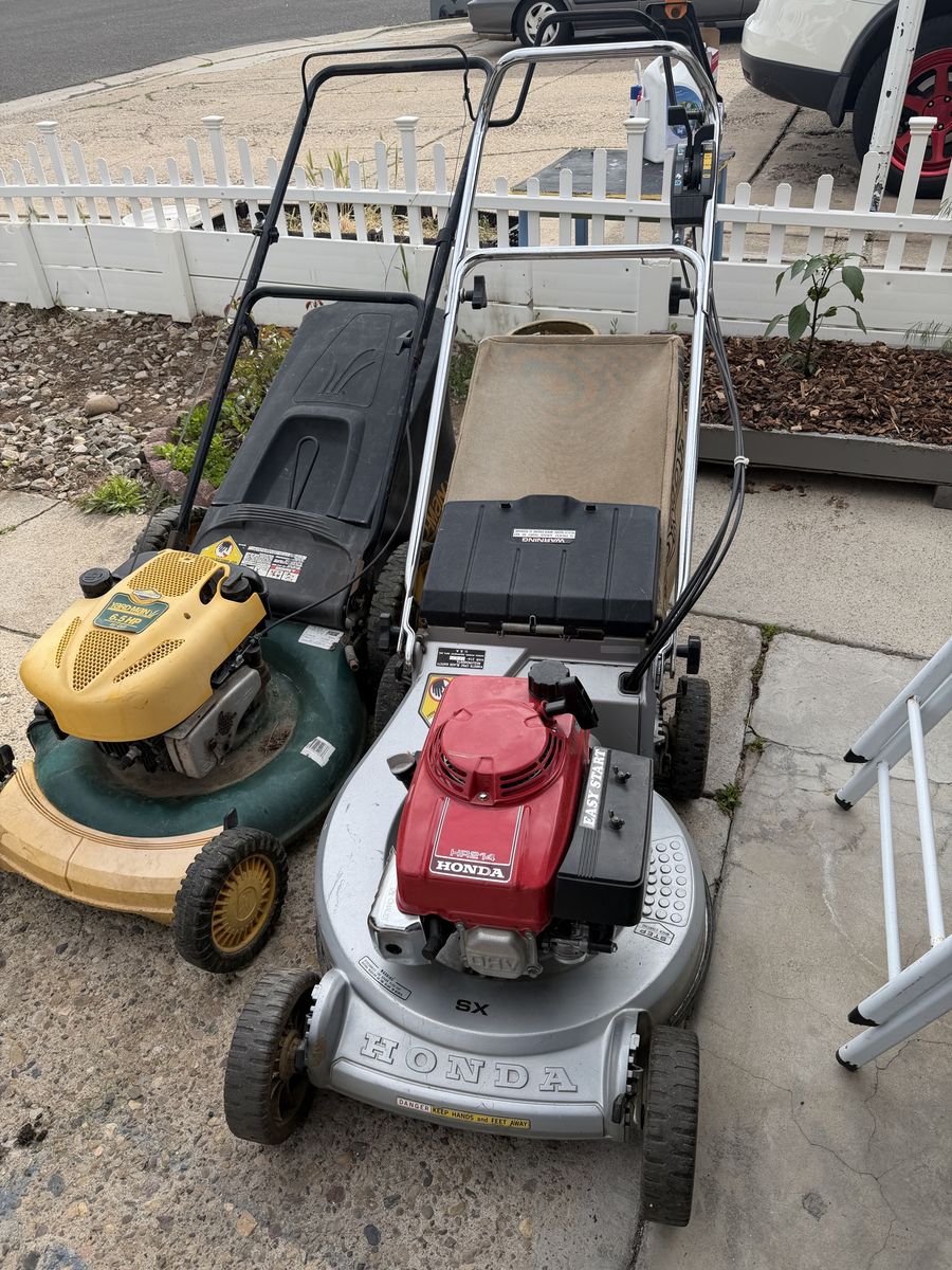 Honda and yard man lawnmowers