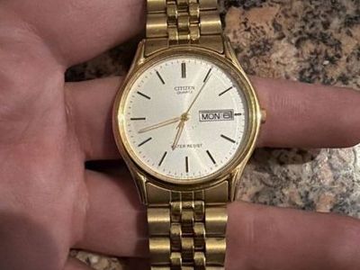 Citizen Quartz Gold-Tone Watch with Day/Date Display - Water Resistant