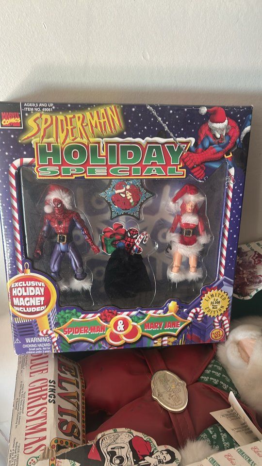 1997 Toy Biz Marvel Comics Spider-Man & Mary Jane Holiday Special limited edition action figure two-pack.