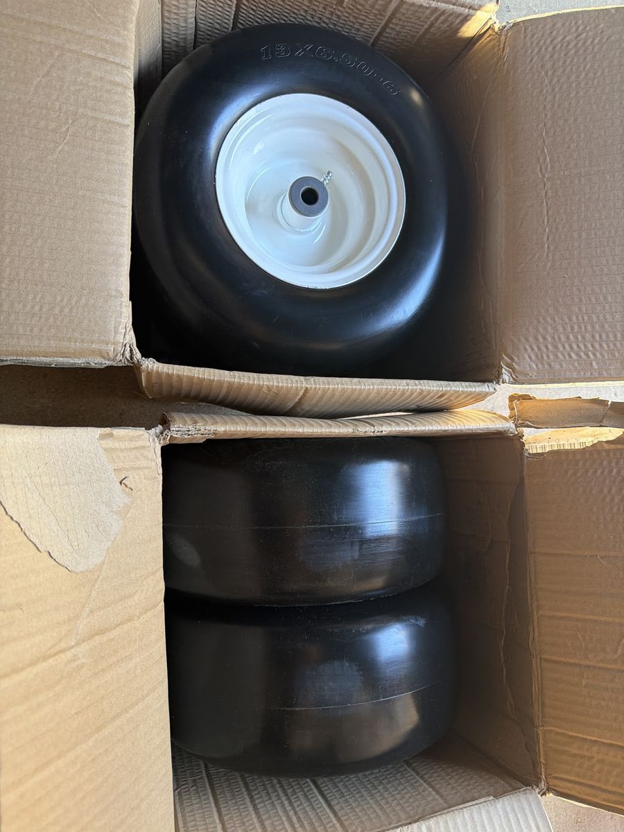 13 x 6.5 x 6 tubeless slick tires set of four with three-quarter inch axle hole and grease dirt
